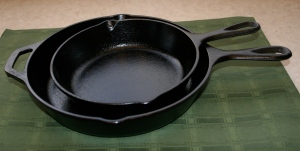 two cast iron skillets
