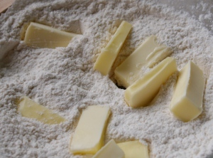 Cut up the butter and add to flour mixture. 
