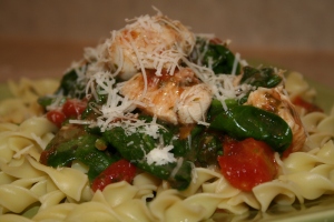 Serve alone or over your favorite pasta. Sprinkle parmesan cheese on top. A smokin' fast dish!