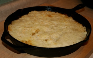 Bake in a 400 degree oven until bubbling and the crust begins to brown, about 30 minutes.