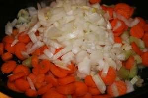 Cook the carrots, celery and onion over medium heat.